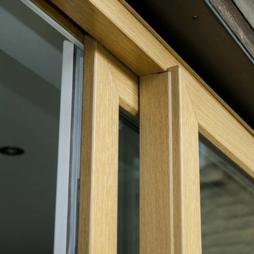 Sliding patio door close up with golden oak finish