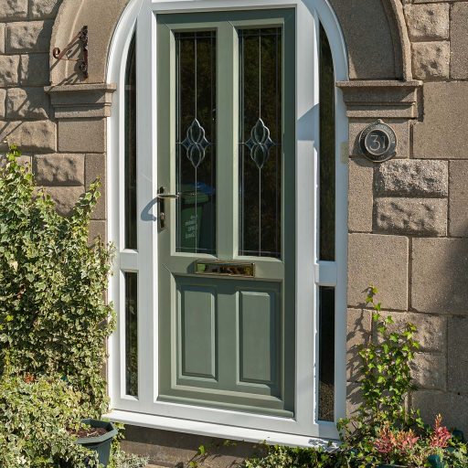 Chartwell green upvc entrance door with gold furniture