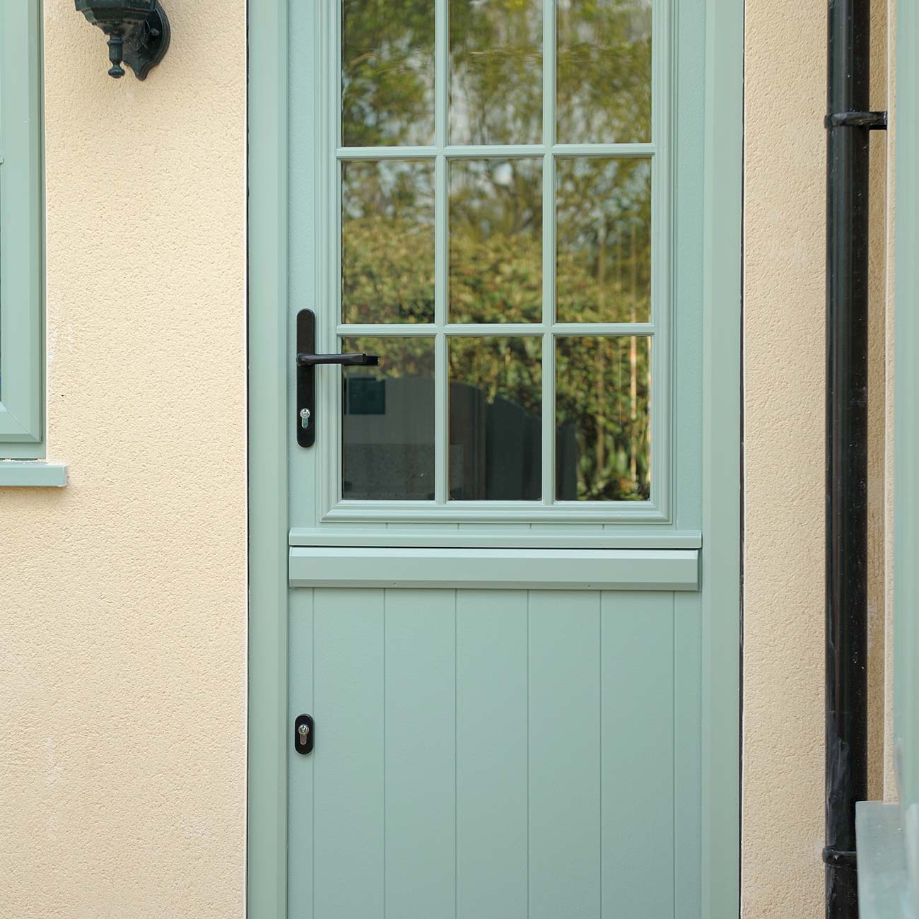 A composite door with stable functionality