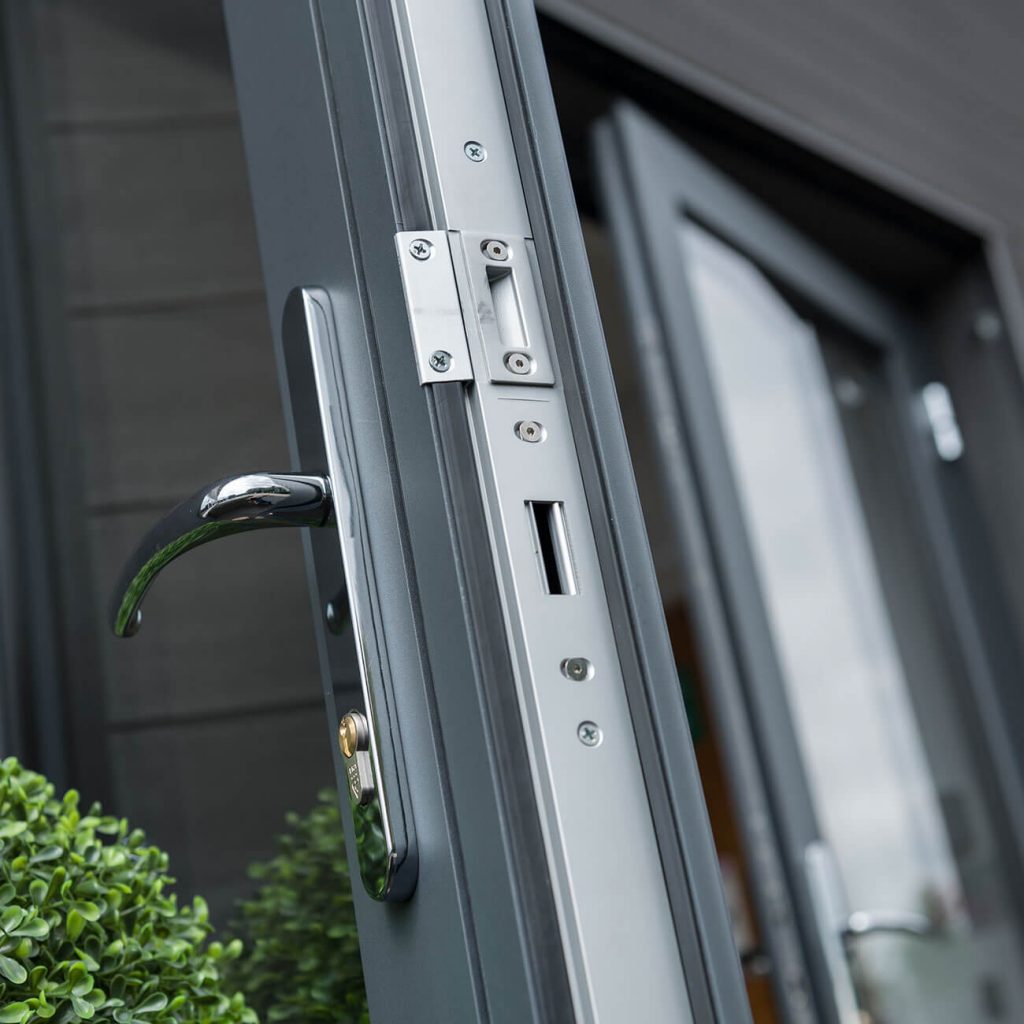 Locking system on secure flush sash patio doors