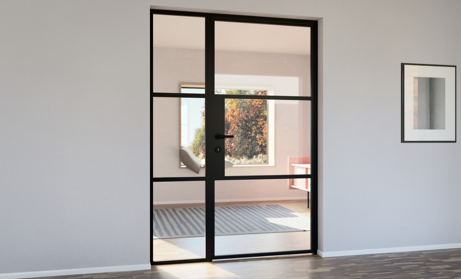 Sleek black-framed glass door leading into a room with a framed picture on the right wall and a large sunny window.