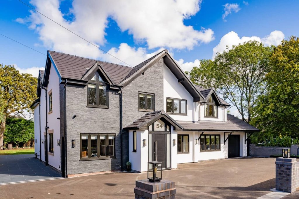 House with new windows, manufactured by Dekko Windows and installed by Bespoke Frames